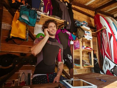 Man working in a surf shop